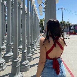 Red crop top with open back criss cross design